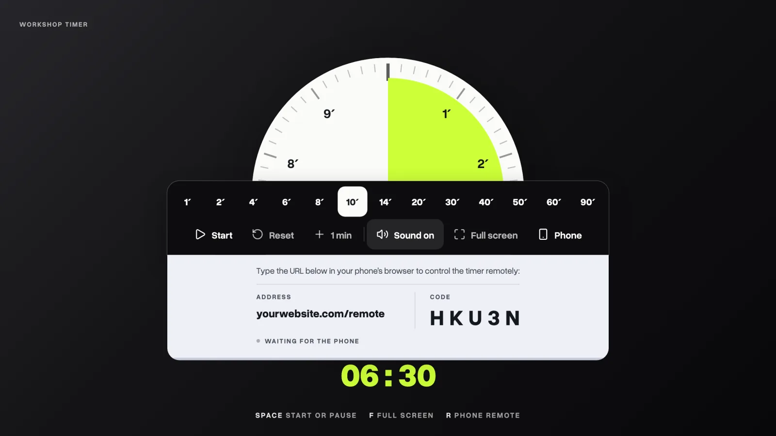 The timer with its pairing code HKU3N on screen, waiting for the phone; in front, a phone with HKU3N typed into the remote